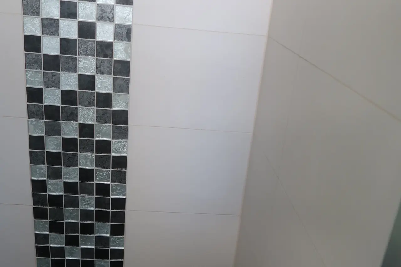 Same mosaic tile corner clean with no mould spots
